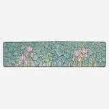 Rare custom tile-top radiator cover with irises by Frank Ferrell and George Krause for Roseville Pottery, c. 1919, glazed earthenware, steel, grout, sold Oct 2024
