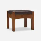 Footstool, model 394 by L. & J.G. Stickley, c. 1913, oak, leather upholstery, brass, sold Oct 2024