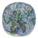 Vase au bouquet (Ramié 304) by Pablo Picasso, 1956, Partially glazed white earthenware clay plate painted in brown, black and green golden lustre, sold Feb 2026