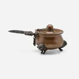 Joseph Heinrichs, Cigar lighter with arrowhead handle and charging buffalo-form feet