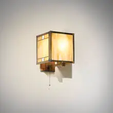 Frank Lloyd Wright, Sconce from the Lake Geneva Hotel, Lake Geneva, Wisconsin, c. 1911, leaded glass, slag glass, copper, wood