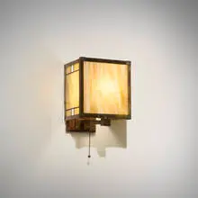 Frank Lloyd Wright, Sconce from the Lake Geneva Hotel, Lake Geneva, Wisconsin, c. 1911, leaded glass, slag glass, copper, wood