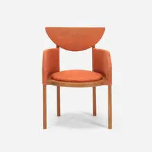 armchair from the Riverview Terrace Restaurant, Spring Green by Frank Lloyd Wright, 1953, stained oak, upholstery, sold Apr 2017