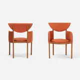 Frank Lloyd Wright, pair of armchairs from the Riverview Terrace Restaurant, Spring Green, 1953, stained oak, upholstery