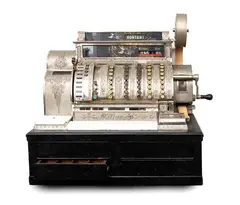 Mechanical cash register Model 592X-ELF by National Cash Register Company, Wooden base with four drawers, offered Sep 2026