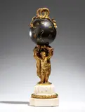 Alfred Daubrée, “Pendule au Globe” table clock in gilded bronze, Louis XVI style, the spherical dial is surmounted by a gilded bronze band that forms a knot in two rings of intertwined laurel