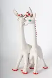 Tarcisio Tosin, Pair of giraffes, sculpture in the round, Made of white ceramic with red and green trim