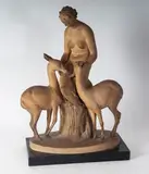 Guido Cacciapuoti, "The Phaoness", Stoneware sculpture in the round with an ebonized wooden base. Cast. Signed G. Cacciapuoti on the base and serial