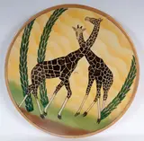 Alberto Rubboli, Polychrome ceramic pomp plate, Full background. Decorated based on a design by Aldo Ajo' with a pair of stylized zebras and palm trees on