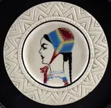 Federico Melis, Plate with decoration of young woman in Desulo costume, Lot includes a contemporary frame. Signed on the back: S.C.I.G.