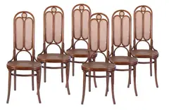 Michael Thonet, Set of six chairs by Thonet, made of bentwood with a woven straw seat and backrest. The backrest is tall and narrow