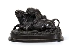 A French patinated bronze animalier group: Taureau terrassé par un ours by Antoine-Louis Barye, Modeled as a bear attacking a bull, offered Dec 2025