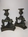 Niccolò Roccatagliata, Pair of candlesticks with satyrs, Dark brown-green patina bronze