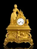 Constantine Louise Detouche, French bronze mantel clock, Gilt bronze case surmounted by a lady in Renaissance dress. Circular dial with Roman numerals signed "C. Detouche
