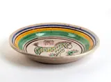 Günther Stüdemann, Round plate with geometrically patterned horse decoration, Sigla sul fondo: ST