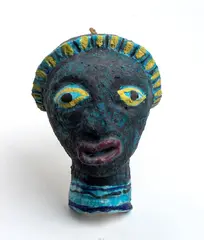 Wall mask with headgear by Salvatore Procida, Signature on the back: Procida, offered May 2025