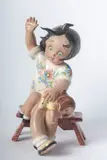 Tiziano Galli, Little girl and doll, full-round sculpture in polychrome ceramic with casting moulding. Signature under enamel in black on the back.