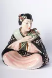 Arturo Pannunzio, Oriental woman, full-round sculpture in polychrome ceramic with casting moulding. Author's signature engraved in the paste on