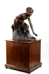 Young boy fishing crabs by Giovanni De Martino, Engraved signature on the bronze base: G. de Martino, offered Dec 2024