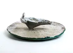 Plate with female figure by Pietro Melandri, 1950, offered Dec 2024