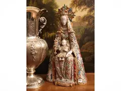 Madonna with Child by Eugenio Pattarino, made of richly decorated polychrome majolica, offered Sep 2026