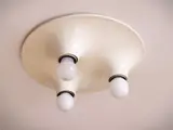 Series of three Triteti ceiling lights, Artemide by Vico Magistretti, in white plastic material, offered Jul 2026