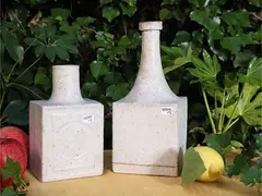 Bruno Gambone, Two white enamelled stoneware bottles, one with cork