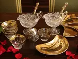 Series of ten golden porcelain salad lunettes by Piero Fornasetti, some defects in the gilding), offered May 2026