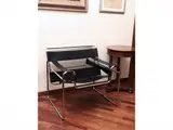 Marcel Breuer, Pair of Wassily armchairs, in chromed steel and black leather
