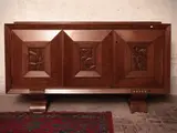 Pier Luigi Colli, Sideboard in walnut, thirties, Three gathering branches decorated with carved bas-relief panels with a motif of corn spigs