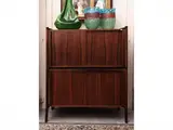 Archimede double belief in exotic woods by Luis Felipe Usabal y Fernandez, with sliding doors, offered Apr 2025
