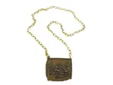 Breast bronze plachet, mounted in yellow gold, 1973 by Pietro Annigoni, bears the verse dedication and date "to Rossella XX-XII-LXXIII", offered Apr 2025
