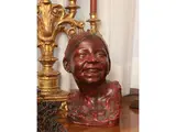 Agostino Giovannini, Laughing boy, Bust in dark red glazed terracotta