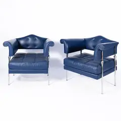 Luca Scacchetti, Prod. Poltrona Frau, pair of Hydra Enif armchairs in chromed metal and padded leather