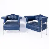 Luca Scacchetti, Prod. Poltrona Frau, pair of Hydra Enif armchairs in chromed metal and padded leather