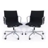 Charles and Ray Eames, Prod. Vitra, Pair of armchairs in chromed metal and fabric