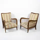 Italian production by Paolo Buffa, Pair of armchairs in wood and padded fabric, offered Jun 2026