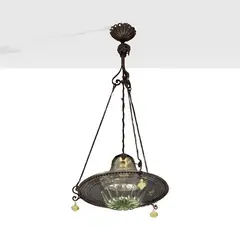 Italian production by Carlo Rizzarda, wrought iron and colored blown glass suspension lamp, offered Jun 2026