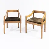 Prod. Cassina by Vico Magistretti, pair of Carimate mod. armchairs in wood and padded fabric, offered Jun 2026