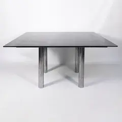 Prod. Gavina by Afra & Tobia Scarpa, Andrè mod. table in chromed metal and fume glass, offered Dec 2025