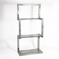 Italian production by Sandro Petti, etagere in chromed metal and transparent glass, offered Dec 2025