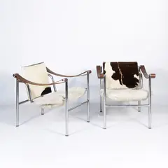 Le Corbusier, Prod. Cassina, pair of armchairs mod. LC1 in chromed metal
