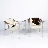Prod. Cassina by Le Corbusier, pair of armchairs mod. LC1 in chromed metal, offered Dec 2025