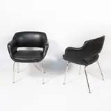 Olli Mannermaa, Prod. Cassina, Pair of armchairs in chromed metal and padded faux leather