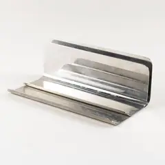 Danish production by Enzo Mari, 1962, silvered metal letter holder, offered Dec 2025