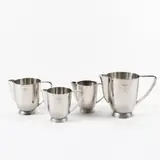 Gio Ponti, Prod. Calderoni, four nickel silver milk jugs