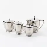 Gio Ponti, Prod. Calderoni, four nickel silver teapots