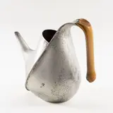 Òscar Tusquets, Prod. Alessi, 1983, silvered metal and wood teapot