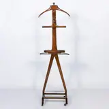 Prod. Fratelli Reguitti by Ico Parisi, wood and brass valet stand, offered Dec 2025