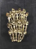 Cucchiai africani by Arman, 1979, bronze and lastra in ferro on pannello, offered Dec 2017